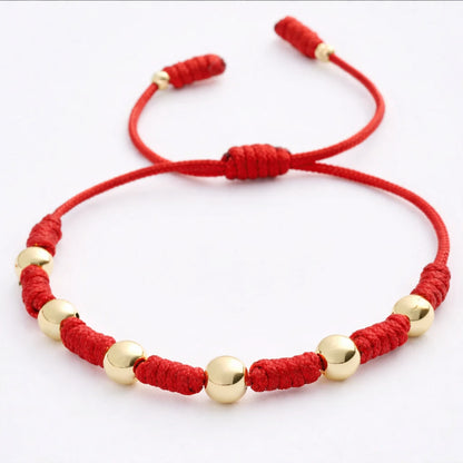 7 Knot Red String Bracelet with Smooth Gold Filled Beads